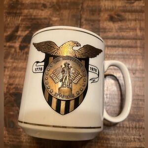 1976 President’s Month with medallion on front.